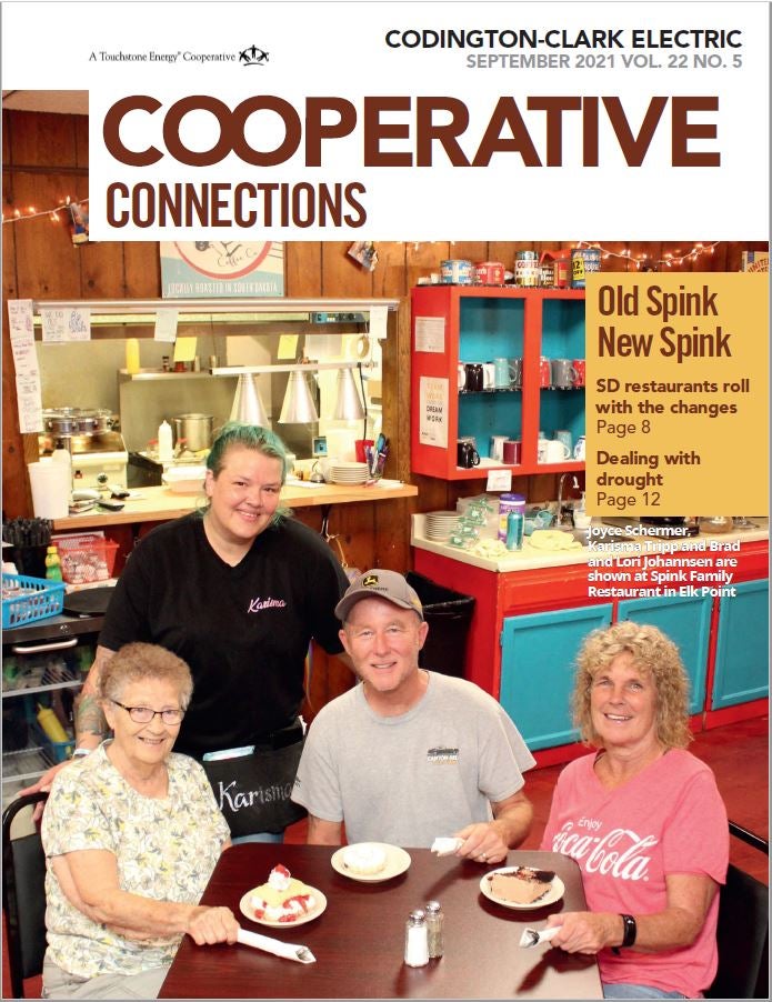 September 21 Magazine Cover Four people in a cafe