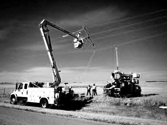 Crew Setting a Pole